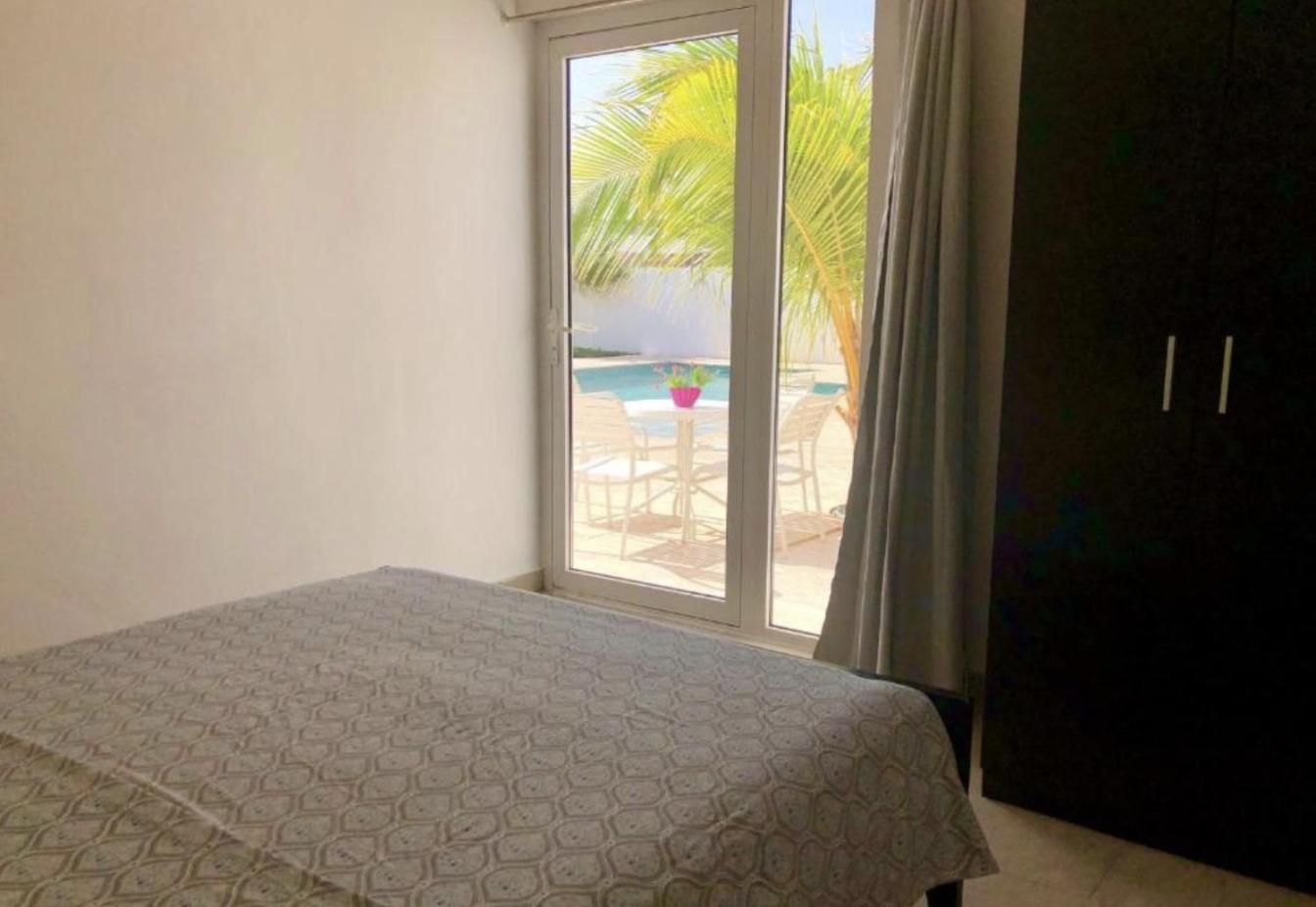 Genesis Apartments Palm Beach Esterno foto